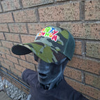 PaRtY CaNnOn - (Glow in the Dark) Logo - GREEN CAMO TRUCKER CAP