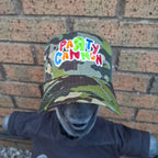 PaRtY CaNnOn - (Glow in the Dark) Logo - GREEN CAMO TRUCKER CAP