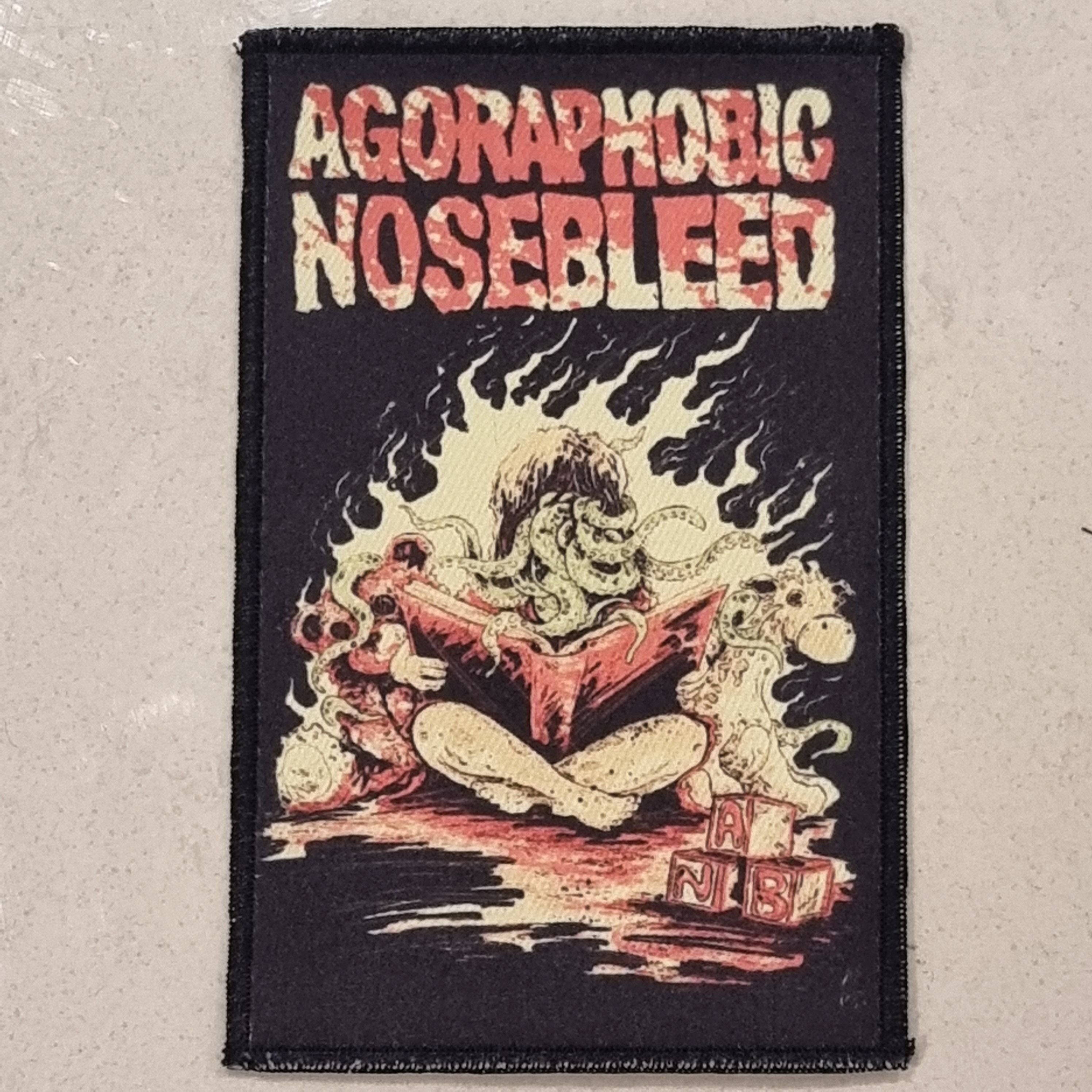 AGORAPHOBIC NOSEBLEED - Octo Book - Patch